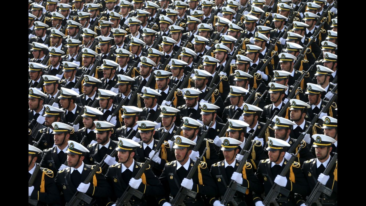 Iranian sailors march in the parade.