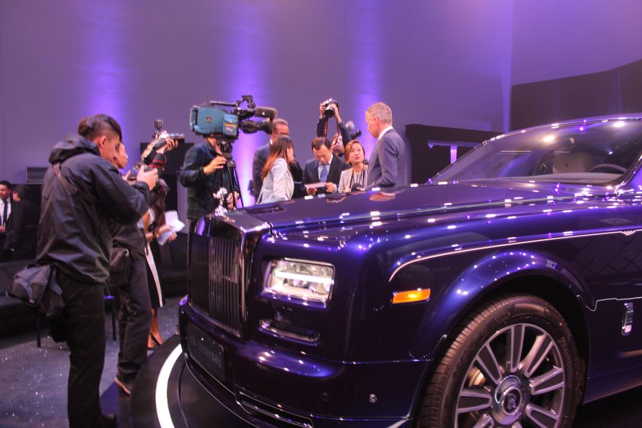 Rolls Royce CEO Torsten Mueller-Oetvoes talks to journalists after unveiling a new model, the Phantom Limelight, on April 18.