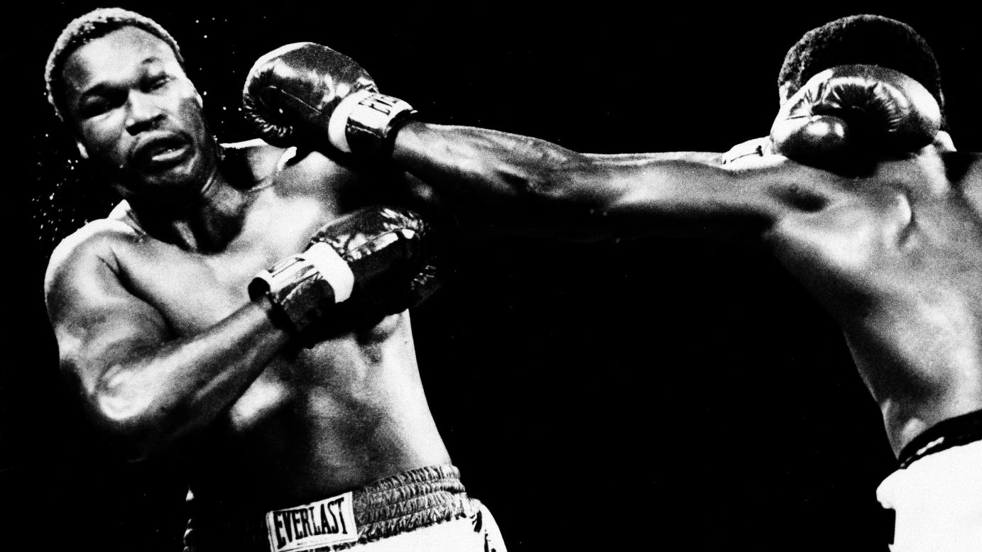 Holmes had won 48 on the spin when he squared up against Michael Spinks. Both were undefeated, both held titles, but as a light heavyweight stepping up a category Spinks was considered the bookies' underdog.<br /><br />Spinks' size disadvantage didn't seem to hamper his performance, and across 15 grueling rounds he outboxed Holmes to a unanimous decision victory (145-142, 145-142, 143-142,) walking away the lineal champion and the first light heavyweight to ever successfully step up a division.<br />