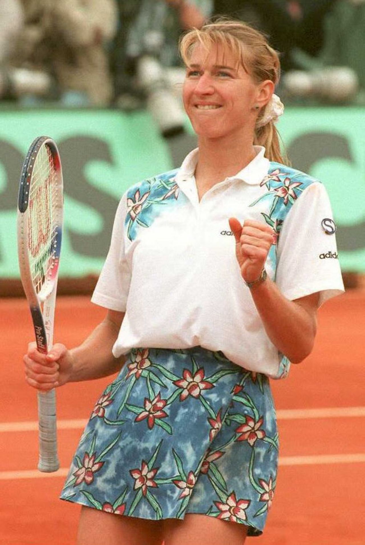 Germany's Steffi Graf wears a floral skirt during the French Open in 1995. Note the scrunchie.  