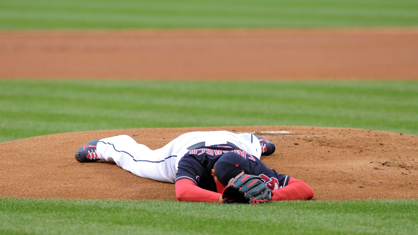 Cleveland pitcher Carlos Carrasco lies on the field after a line drive struck him in the jaw on Tuesday, April 14. Carrasco came out of the game and went to the hospital, but fortunately he was only bruised.