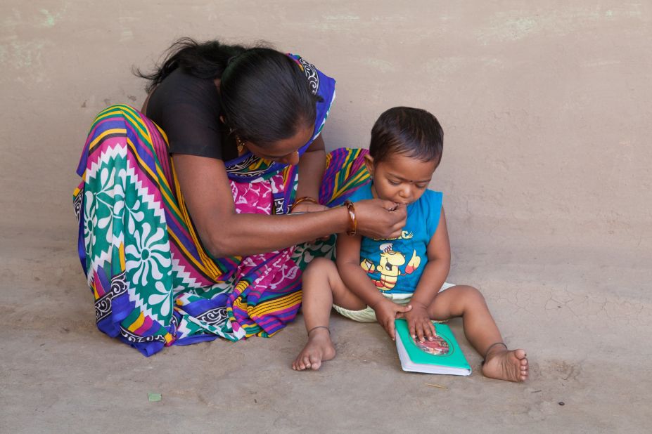 Yogita Kanhaiya feeds her son. He has no idea where his father has gone. She had imagined a very different future for herself and her young family.