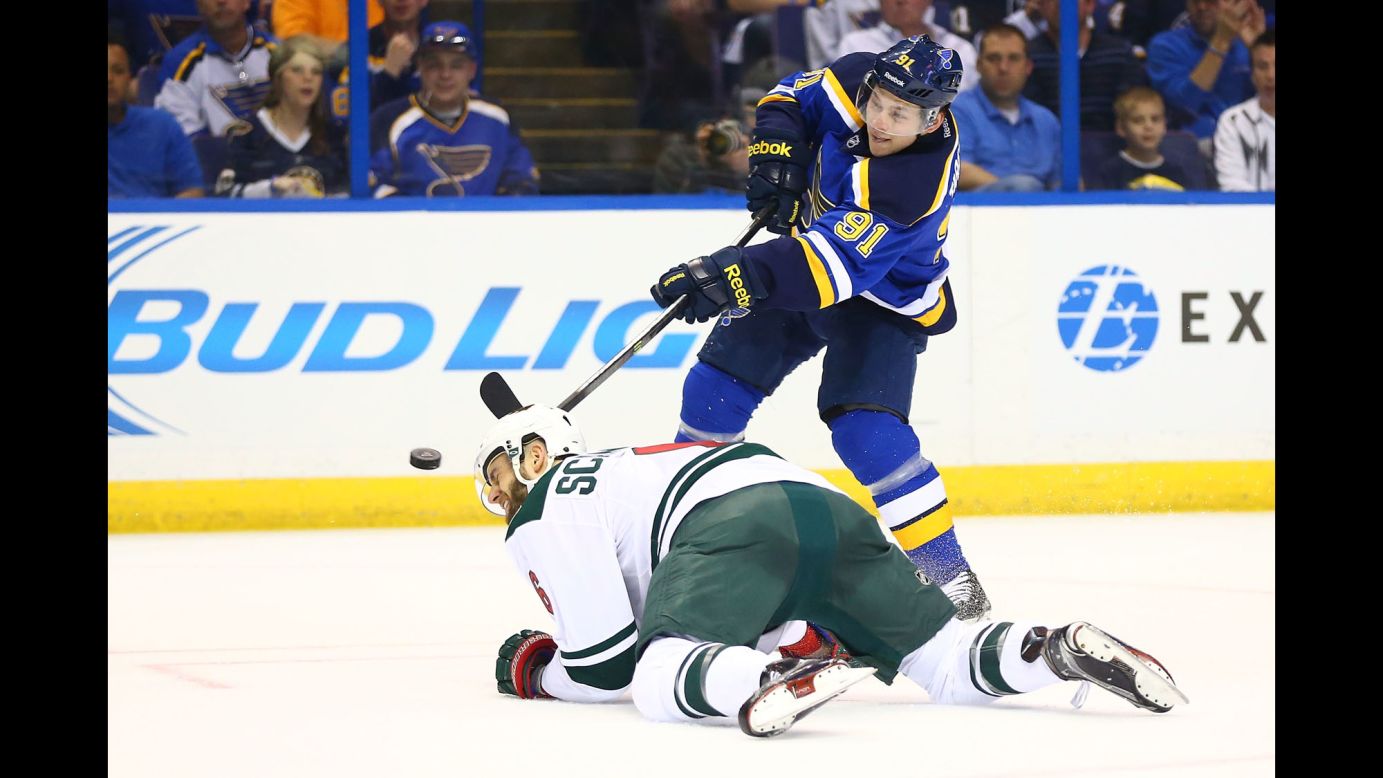 St. Louis forward Vladimir Tarasenko shoots the puck past Minnesota's Marco Scandella during Game 1 of their Western Conference playoff series on Thursday, April 16. Minnesota took the opening game 4-2.