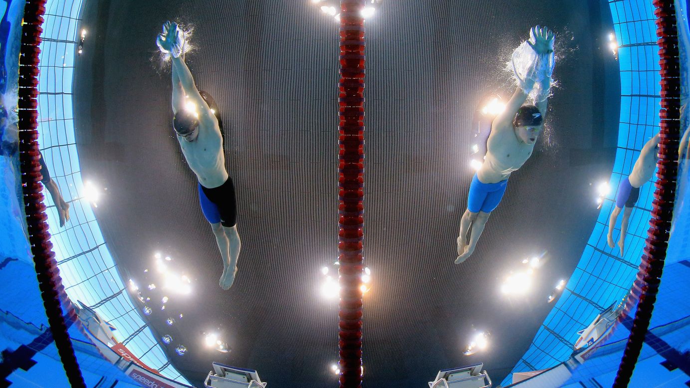 Junior swimmers Jamie Ingram, left, and Kyle Chisholm race in the 200-meter butterfly Wednesday, April 15, during the British Swimming Championships in London.