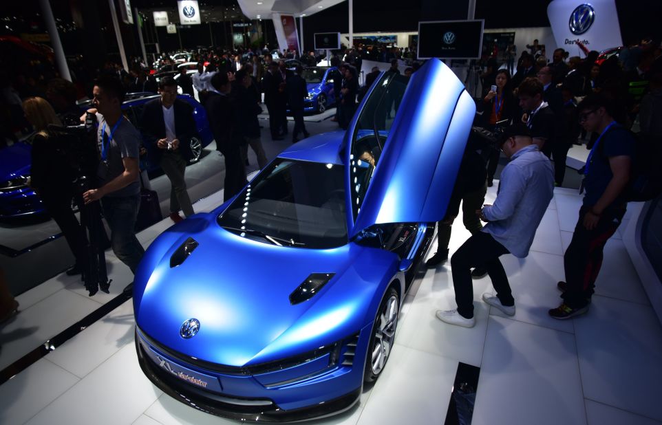 An electric blue VW XL sport concept car grabs attention in Shanghai. First debuted at the Paris Motor Show, the car can accelerate from 0 to 62 mph in 5.7 seconds.
