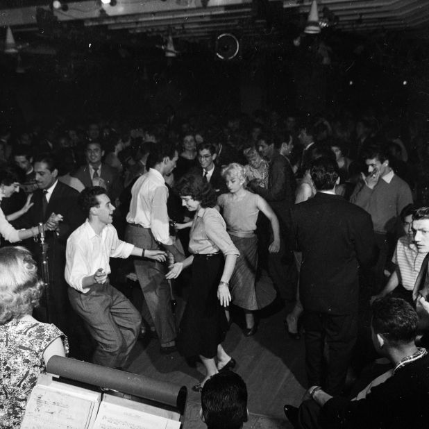  Londoners enjoy the nightlife in Soho in 1956.