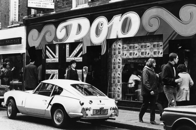  A shop called Pop, on Carnaby Street in London's West End. A Triumph Spitfire GT6 is parked outside. 