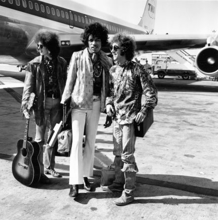 Popular rock trio the Jimi Hendrix Experience at London Airport with their hand luggage. They are, from left to right; Noel Redding (1945 - 2003), bass player, Jimi Hendrix, singer, guitarist and songwriter, and Mitch Mitchell, drummer. Hendrix played his first gig to the press in 1966 at Soho's Bag O' Nails club. 