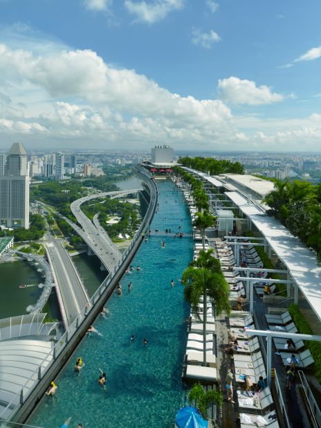 Marina Bay Sands hotel guests have access to its Infinity pool. Some 200 meters above ground, it's longer than three Olympic-sized swimming pools. Its architect calls it "the best pool in town."