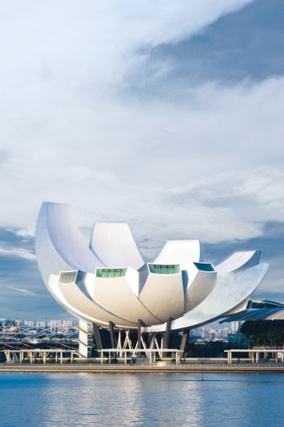 Singapore's striking ArtScience Museum is part of the Marina Bay Sands complex. Safdie designed it to "float above the ground." Some see it as a bunch of bananas, some as a lotus flower and some as a hand of welcome.