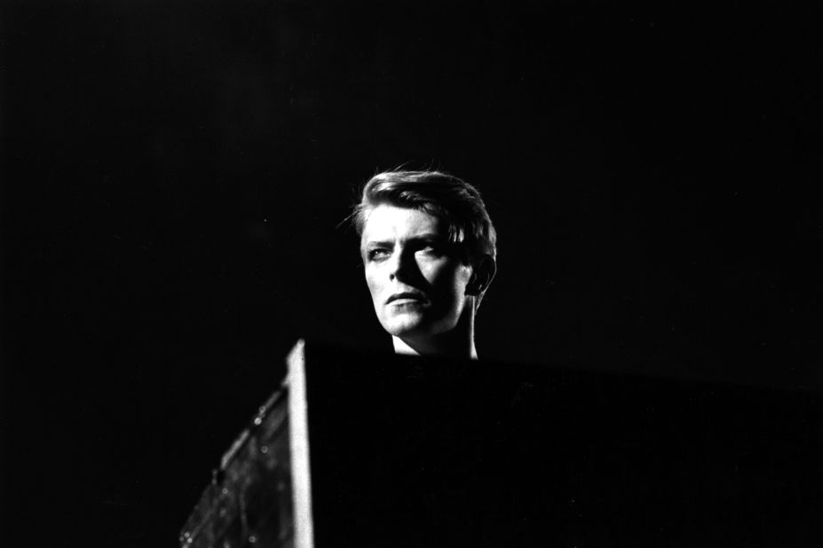 British pop singer David Bowie in concert at Earl's Court, London during his 1978 world tour. During the 1960s, Bowie was a regular on Tin Pan Alley, a meeting place for musicians.