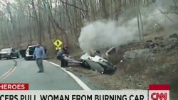 ac intv ehrenburg ferriola officers pull woman from burning car_00023317.jpg