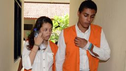 Heather Mack (L) and Tommy Schaefer (R) of the US walk to a court room for a trial hearing in Denpasar on Indonesia's resort island of Bali on March 11, 2015. Mack and Tommy Schaefer are facing separate trials in Bali for the murder of her mother, 62-year-old Sheila von Wiese Mack, whose body was found rammed in a suitcase in the boot of a taxi outside an exclusive resort in August last year. AFP PHOTO / SONNY TUMBELAKA (Photo credit should read SONNY TUMBELAKA/AFP/Getty Images)