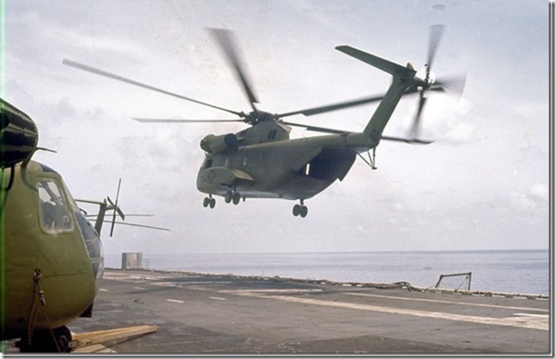 A powerful CH-53 Sea Stallion helicopter departs the USS Hancock to evacuate Saigon in April, 1975.