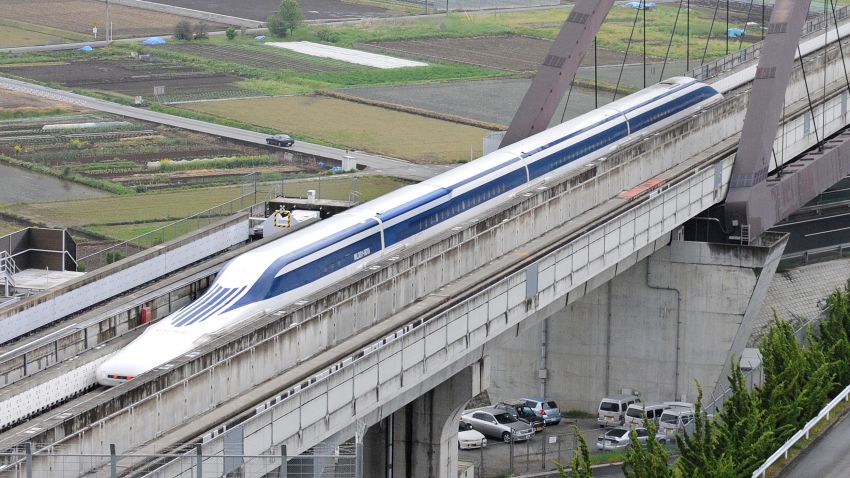 File photo: A Japanese maglev (magnetic levitation) train speeds during a test run on the experimental track in Tsuru, 100km west of Tokyo, on May 11, 2010.