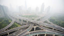 Cars are seen on an elevated road on a heavy polluted day in Shanghai on April 19, 2015. AFP PHOTO / JOHANNES EISELEJOHANNES EISELE/AFP/Getty Images