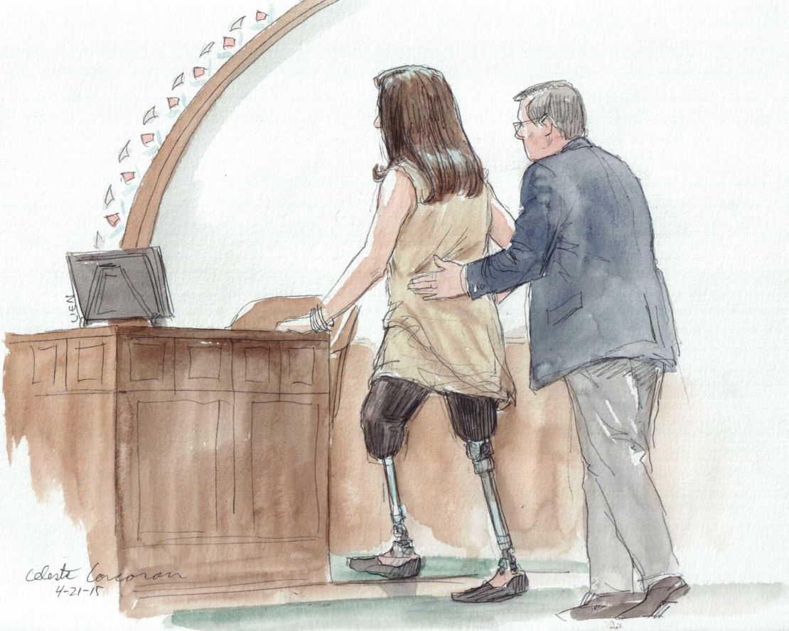 Celeste Corcoran, who lost both her legs in the Boston Marathon bombing, approaches the witness stand to testify in the sentencing phase of Dzhokhar Tsarnaev's trial.