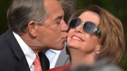 House Speaker John Boehner kisses House Minority Leader Nancy Pelosi during a reception in the Rose Garden of the White House on April 21, 2015.