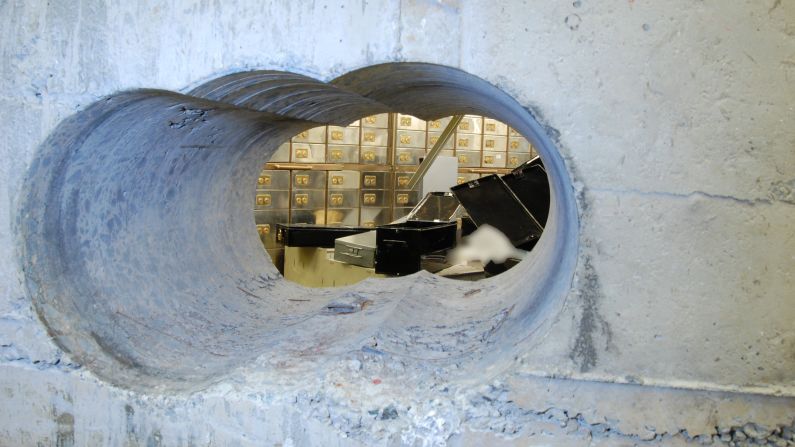 The heist in April targeted the Hatton Garden Safe Deposit Ltd., which has been <a href="index.php?page=&url=http%3A%2F%2Fwww.cnn.com%2F2015%2F04%2F08%2Feurope%2Flondon-hatton-garden-heist%2F" target="_blank">"the epicenter of London's jewelry trade since medieval times."</a> Police believe it took days. This hole through a vault wall is about 10 inches high and 18 inches wide. The wall is composed of 20 inches of reinforced concrete, so the drilling alone likely took a while. 