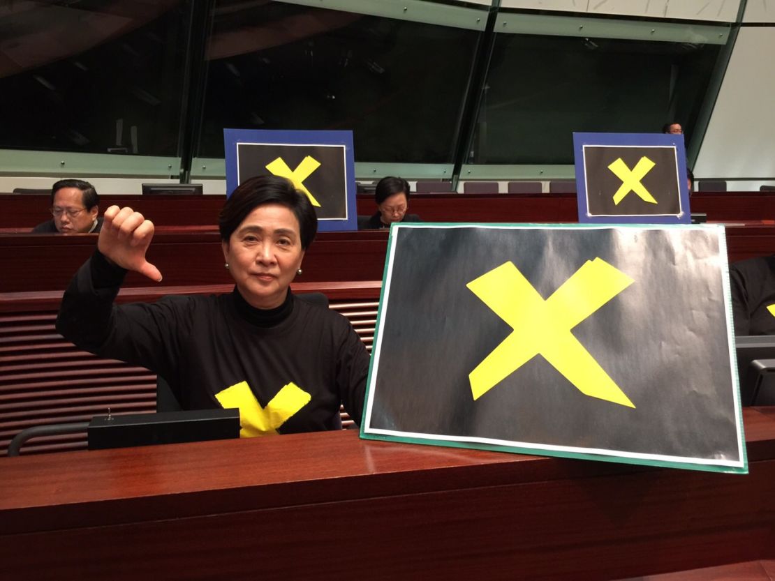 Hong Kong Democratic Party chairwoman Emily Lau signals her intent to to veto.