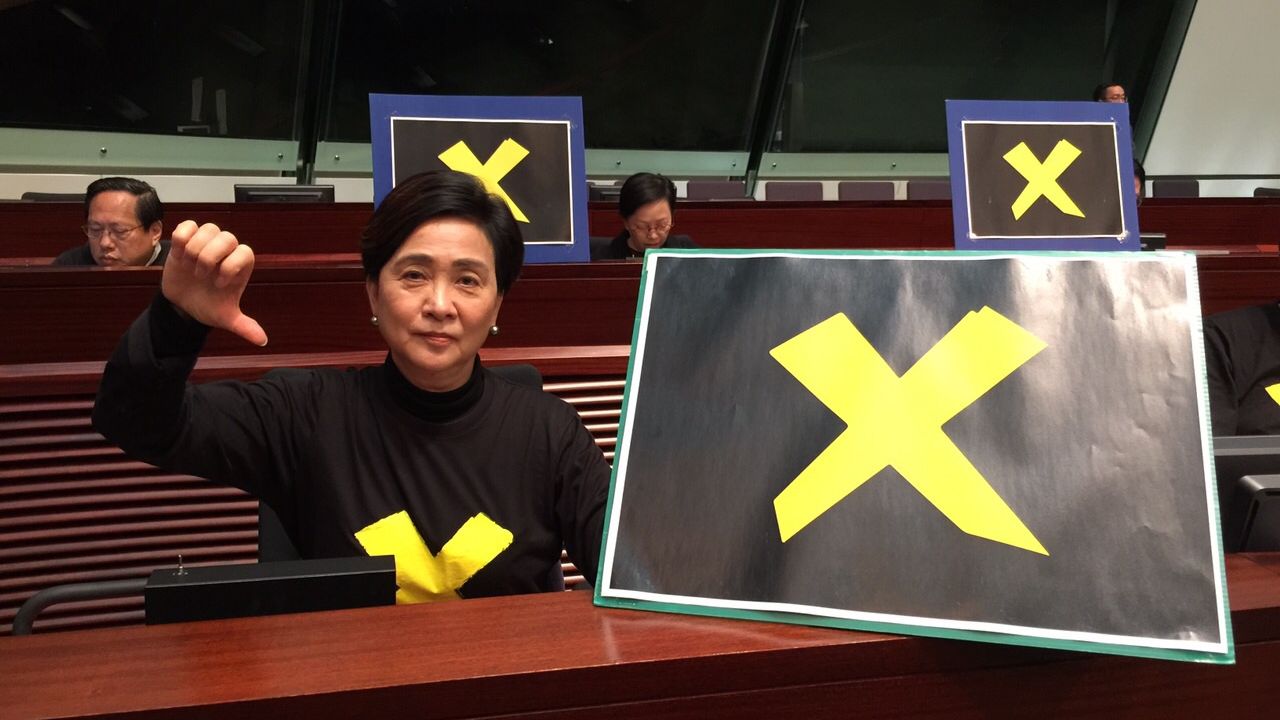 Hong Kong Democratic Party chairwoman Emily Lau signals her intent to to veto.