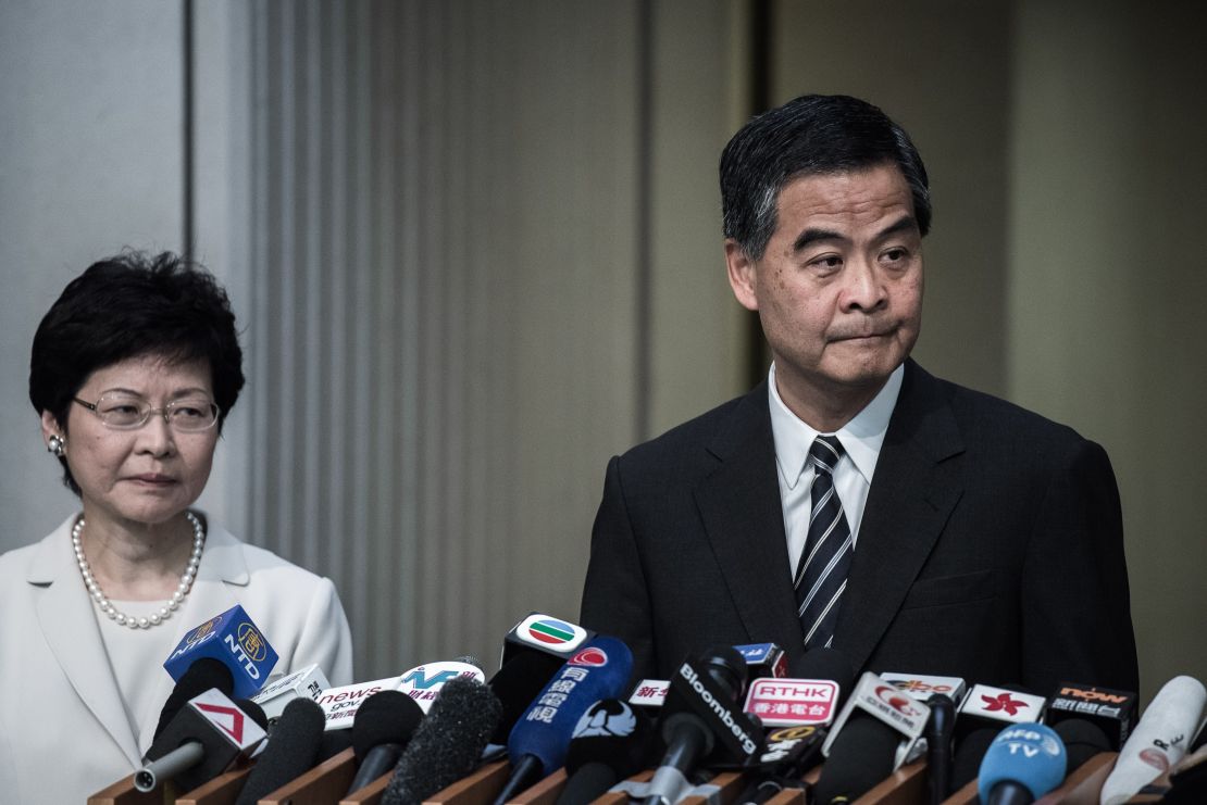 Hong Kong Chief Executive Leung Chun-ying (right) addresses a press conference next to Chief Secretary Carrie Lam (left) in Hong Kong on April 22, 2015.