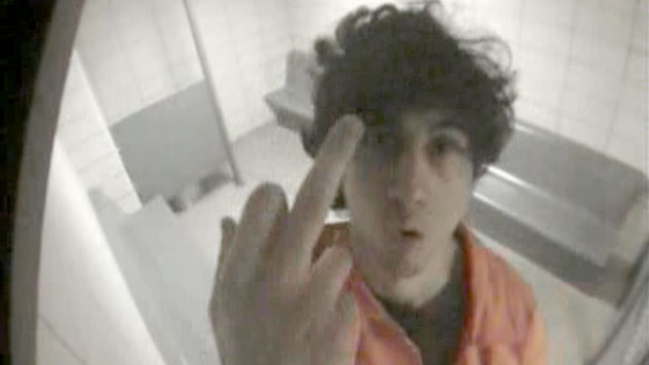 Tsarnaev "flips the bird" in a jail cell during his first arraignment on July 10, 2013. The image was presented to jurors in the sentencing phase of his trial.