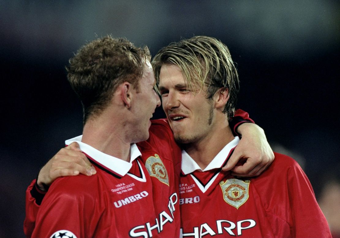 Nicky Butt and David Beckham of Manchester United celebrate victory over Bayern Munich after the UEFA Champions League Final at the Nou Camp in Barcelona, Spain.