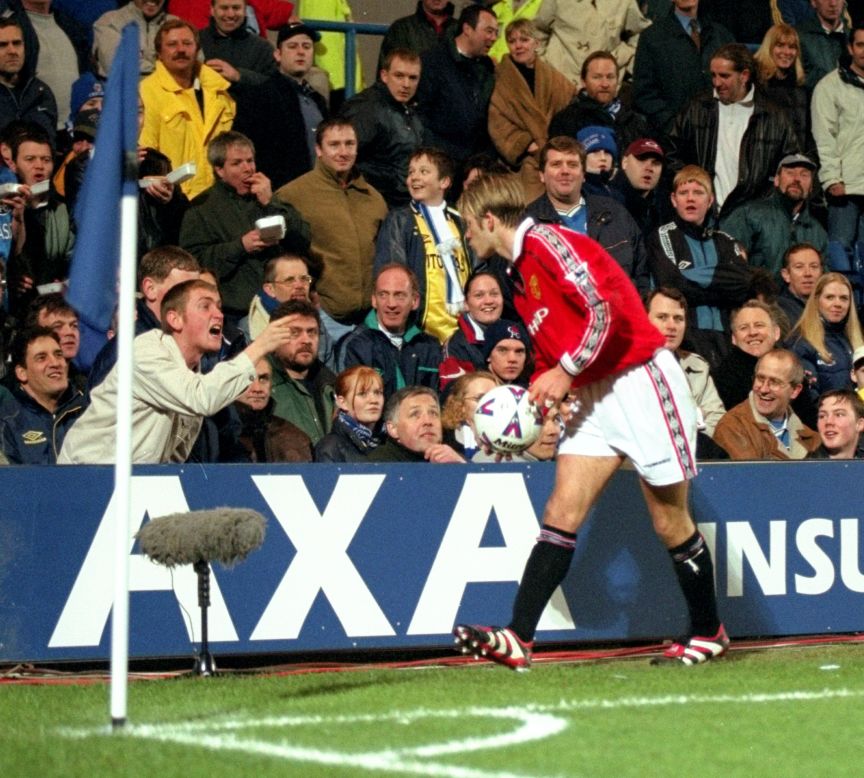 As well as facing vitriol over the World Cup debacle, the seemingly effeminate Beckham was an easy target for fans at rival Premier League clubs. Here he blows a kiss to Chelsea supporters during United's run to winning the FA Cup in '99.  