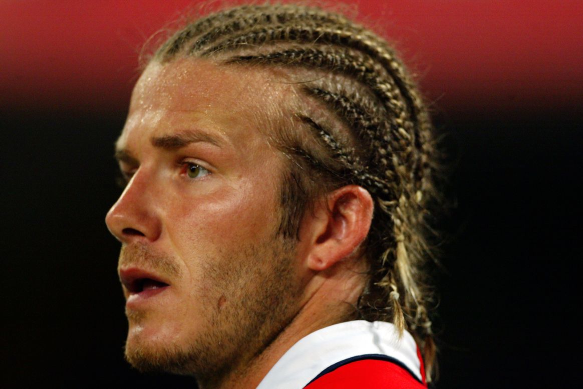 There were the haircuts, such as this corn-row style sported while representing England in 2003. 