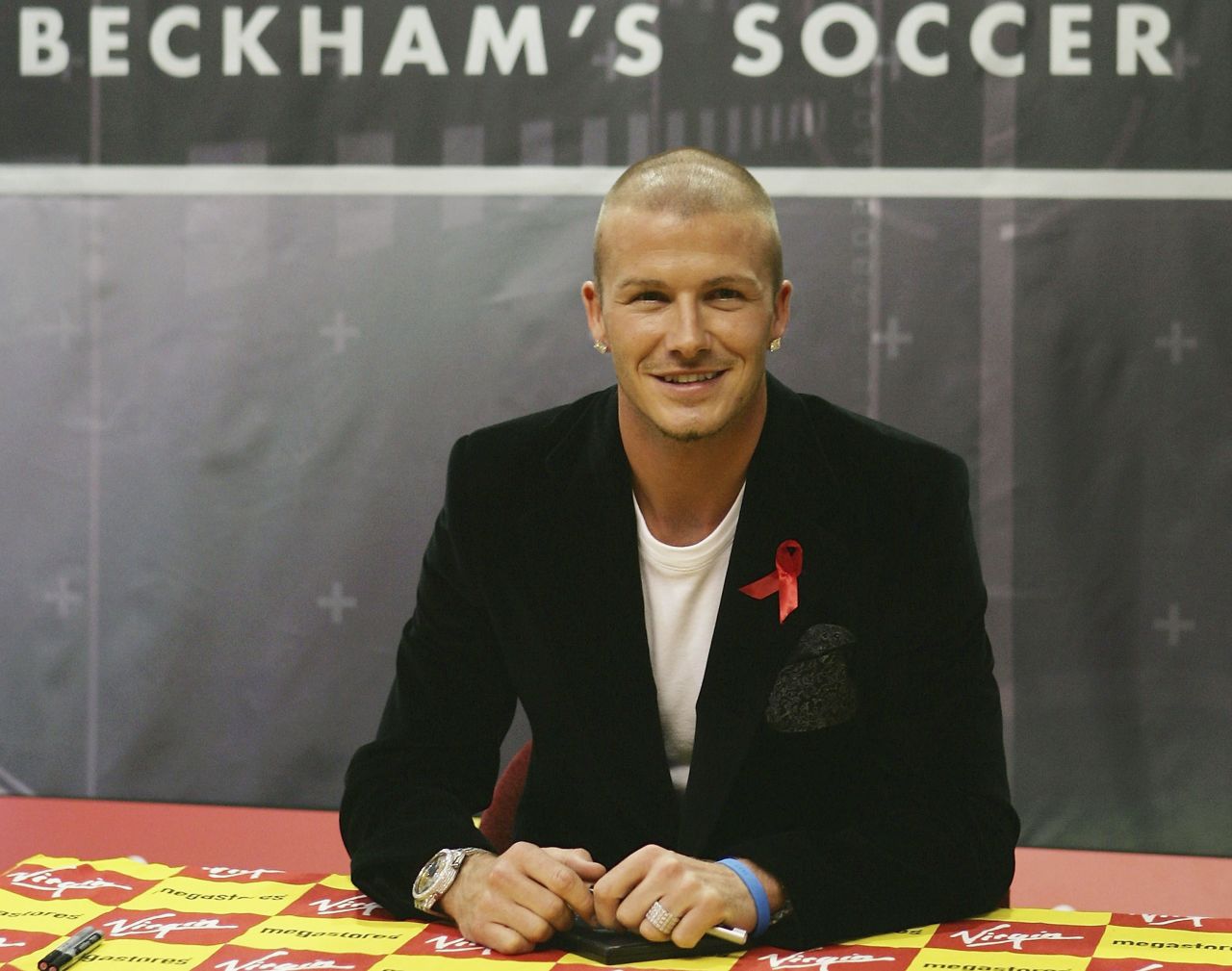 After leaving Manchester United for Real Madrid in 2003, his follicles were regularly the focus of media attention. Here a shaven-headed Beckham promotes his first official training skills DVD -- "Really Bend It Like Beckham," a title referring to the 2002 British film starring a young Keira Knightley as an aspiring footballer.