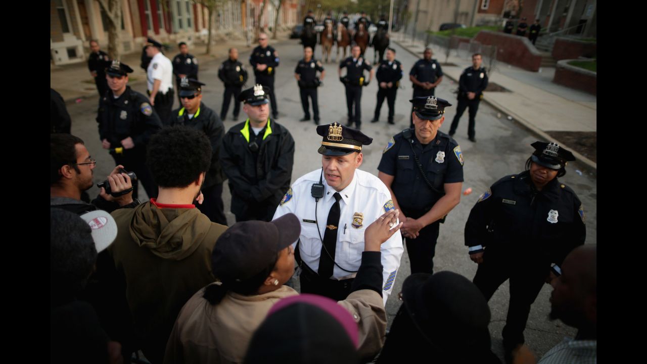Demonstrators argue with Baltimore officers during the protest on April 22.
