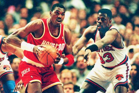 Hakeem Olajuwon joined the Houston Rockets in 1984, and led them to consecutive NBA championships in 1994 and 1995. The Nigerian-born center ended his career at the Toronto Raptors, retiring in 2002.