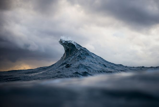 <a href="http://raycollinsphoto.com/" target="_blank" target="_blank">Ray Collins</a>' awe-inspiring images have the power to bring the earth's primal force to a standstill. Here, the 32-year-old Australian captures a split second in the sea to reveal the wave's twisted topography, and the momentary splashes of light across the surface.