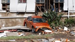 A car is seen among the debris of houses destroyed by cyclonic winds.  More than 200,000 were affected by the massive storm in record.