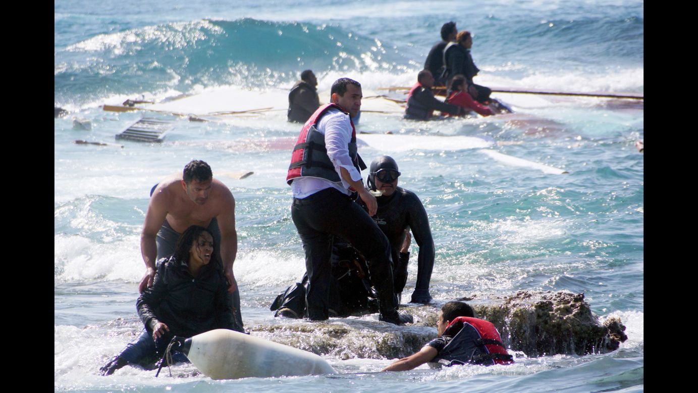 Migrants are rescued from the Aegean Sea, off the coast of the Greek island of Rhodes, on Monday, April 20. Greek authorities said that at least three people died after their wooden boat ran aground. There has been <a href="http://www.cnn.com/2015/04/21/world/gallery/europe-migrant-crisis/index.html" target="_blank">a recent surge</a> in the number of migrants making the dangerous journey toward Europe's shores.