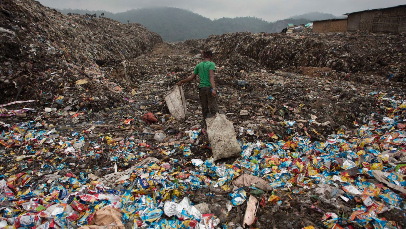 A boy pulls a bag filled with recyclable material at a garbage dump in Gauhati, India, on Wednesday, April 22. <a href="http://www.cnn.com/2015/04/14/world/cnnphotos-boragaon-landfill-india/index.html" target="_blank">Related: Living inside a landfill</a>