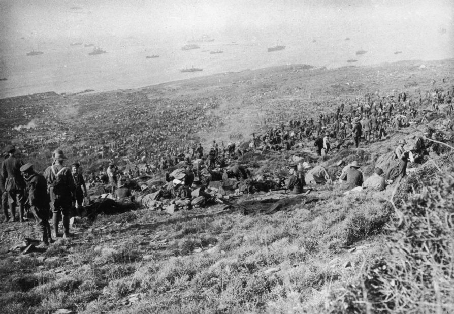 In August, more British troops landed at Suvla Bay in an attempt to help the Allies break out of Anzac Cove. Here, British troops of the IX Corps are seen scattered over a coastal hillside after landing at Suvla before the August offensive in 1915. A large number of British ships can be seen out at sea.