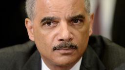 U.S. Attorney General Eric Holder attends a meeting with the My Brother's Keeper Task Force to receive a 90-day report on its progress in the Roosevelt Room of the White House in May 2014. 