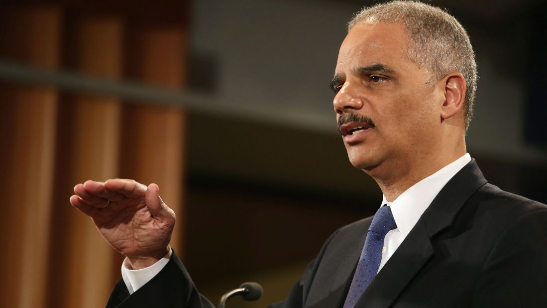 Holder takes questions at a news conference in May 2013. He said he recused himself from a national security leak investigation in which prosecutors obtained the phone records of Associated Press journalists.
