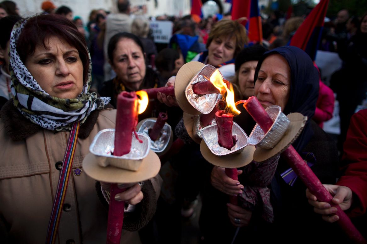 Armenian women hold torches during a march in Jerusalem, Israel, on Thursday, April 23, commemorating the 100th anniversary of what many historians call the first genocide of the 20th century. Turkey disputes the claim, arguing that it was a war with losses on both sides.