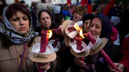 Armenian women hold torches during a march in Jerusalem, Israel, on Thursday, April 23, commemorating the 100th anniversary of what many call the first genocide of the 20th century. In 1915 the Ottoman Empire began the systematic extermination of its Armenian minority population. An estimated 1.5 million Armenians died in the massacre .