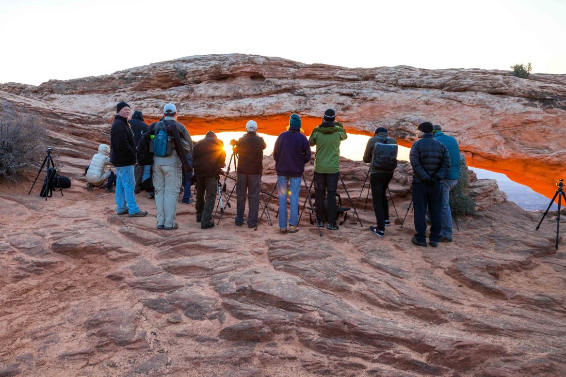 To get the classic shot you should arrive at least an hour before sunrise to stake our prime photography real estate in front of the arch. If you aren't here in time, a line of tripods and photographers will almost certainly block any chance of getting your classic Mesa Arch photo.  