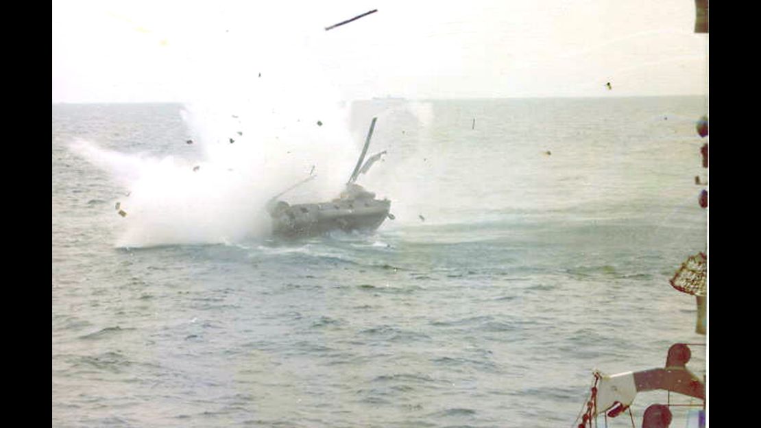 Ba Van Nguyen's helicopter smashes into the water after he risks all to save his wife and their three children.