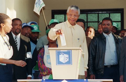 Nelson Mandela casts his historic vote during South Africa's first democratic general elections. The freedom fighter and president of the African National Congress, who had previously spent 27 years locked up in prison, reconciled South Africa after the fall of apartheid.  
