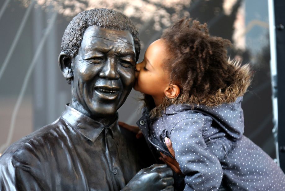 After suffering poor health for some time, Mandela eventually succumbs to a lung infection on December 5, aged 95. After a memorial service held at Johannesburg's Soccer City stadium -- attended by many world leaders and celebrities -- Mandela is buried in his childhood village of Qunu on December 15.