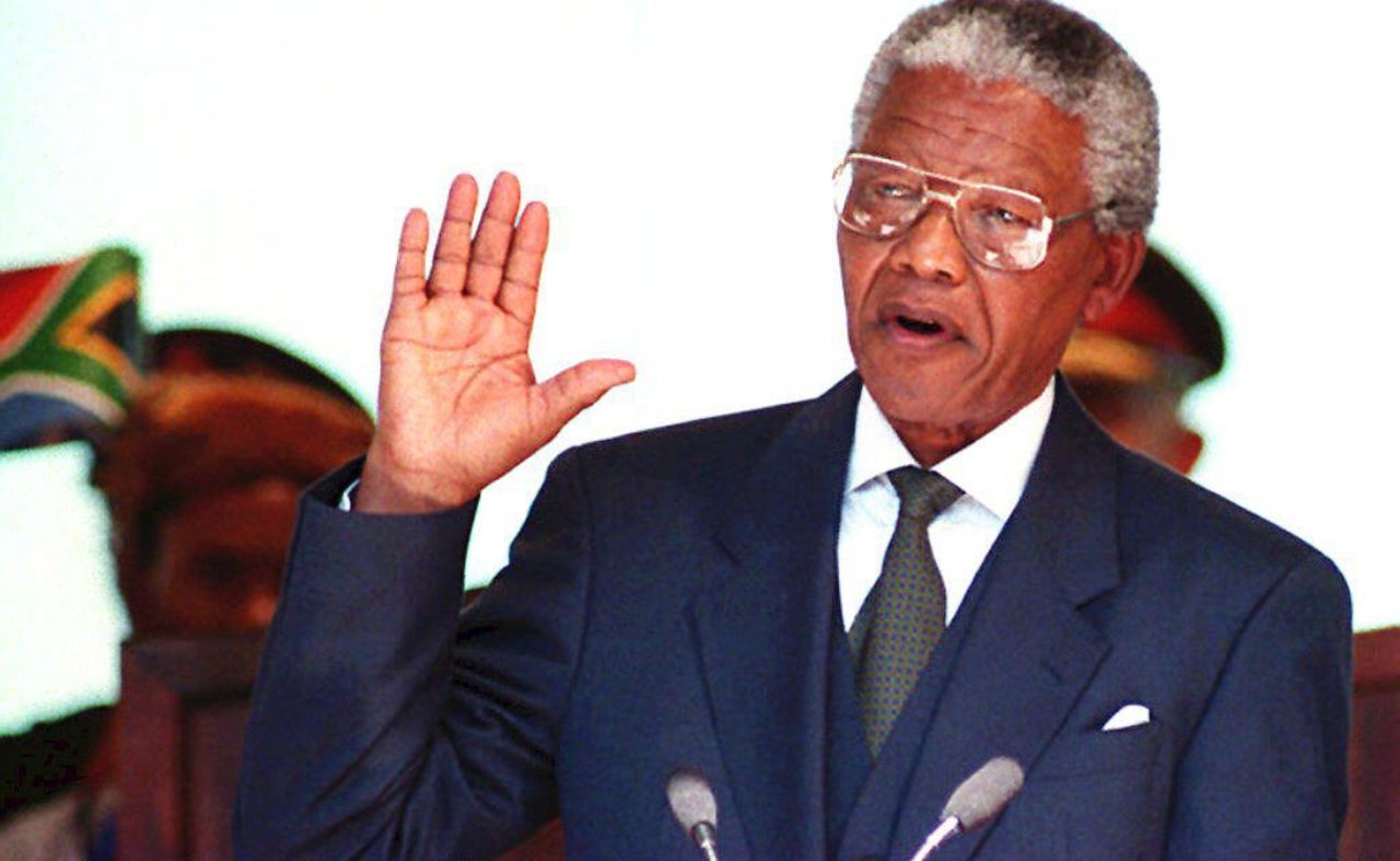 Mandela is sworn in on May 10, becoming South Africa's first black president.