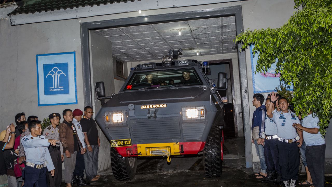 A police armored vehicle believed to be carrying Mary Jane Veloso leaves Wirogunan prison in Yogyakarta.