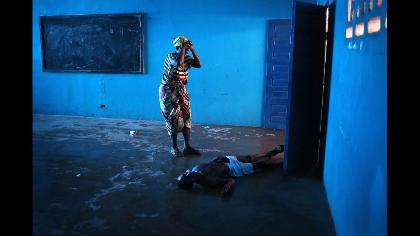 Getty Images special correspondent <strong>John Moore</strong> has taken the top prize in Sony World Photography Awards 2015 for his early exposure of the Ebola epidemic in Liberia's capital Monrovia. 