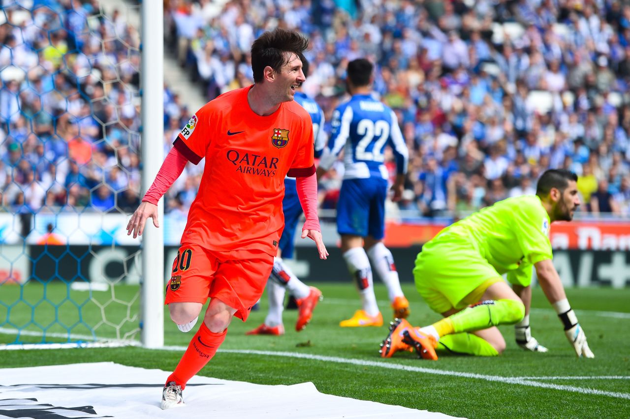 Messi scores his 47th goal this season as Barcelona extends its league lead to five points with a 2-0 win in the Catalan derby at Espanyol.